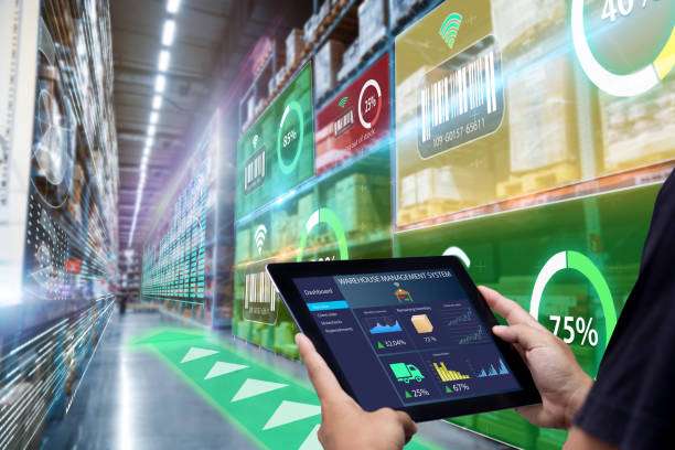Worker hands holding tablet on blurred warehouse as background Worker hands holding tablet on blurred warehouse as background
