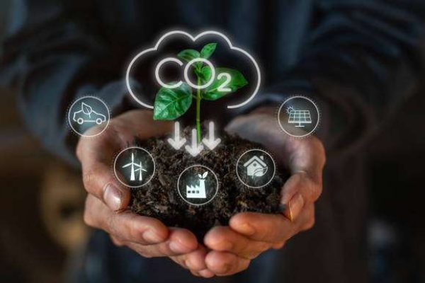 carbon bbb Reduce CO2 emission concept in the hand for environmental, global warming, Sustainable development and green business based on renewable energy and without carbon dioxide emissions.